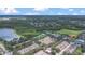 Wide aerial view of community, showcasing amenities, green spaces, and residential area at 13118 Honey Locust Dr, Orlando, FL 32828