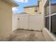View of the backyard featuring a privacy fence and natural lighting at 13118 Honey Locust Dr, Orlando, FL 32828