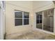 This patio features durable floors, natural lighting, and a large sliding glass door at 13118 Honey Locust Dr, Orlando, FL 32828
