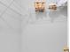 A walk-in closet featuring ample storage space with white wire shelving at 13118 Honey Locust Dr, Orlando, FL 32828