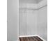 The primary walk-in closet has ample storage space and wire shelving at 13118 Honey Locust Dr, Orlando, FL 32828