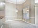 Dining area featuring tile floors, a modern chandelier, and a window with natural light at 13139 Paloma Dr, Orlando, FL 32837