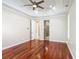 Large bedroom with hardwood floors and an en-suite bathroom with a shower at 13139 Paloma Dr, Orlando, FL 32837