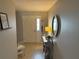 Bright entryway showcasing neutral walls, stylish decor, and a welcoming atmosphere at 1381 Woodlark Dr, Haines City, FL 33844