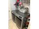 Modern laundry room boasts updated appliances and ample storage space, ready for use at 1381 Woodlark Dr, Haines City, FL 33844