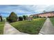 Relax in this green space with picnic tables, benches, and walking path between buildings at 1651 W Oak Ridge Rd # 1651A, Orlando, FL 32809