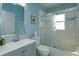 Bright bathroom features a shower-tub combination and vanity with storage at 1701 Knotting Hill Dr, Orlando, FL 32835