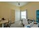 Bright bedroom with neutral walls, closet, and a sunlit window at 1701 Knotting Hill Dr, Orlando, FL 32835