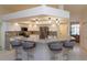 Modern kitchen with granite countertops, stainless steel appliances, and breakfast bar seating at 1701 Knotting Hill Dr, Orlando, FL 32835