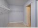 Spacious walk-in closet with wire shelving at 1701 Knotting Hill Dr, Orlando, FL 32835