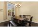 Dining room with a large window and a view of the outside at 1723 Lee Janzen Dr, Kissimmee, FL 34744