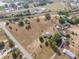 Property aerial highlighting location near roadways, railways, with an established homes at 2300 Olsen Rd, Haines City, FL 33844