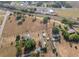 Aerial shot of the property, showing its location near roadways, railways, and existing residential areas at 2300 Olsen Rd, Haines City, FL 33844
