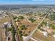 Expansive lot with mature trees, located near roadways, railways, and residential neighborhoods at 2300 Olsen Rd, Haines City, FL 33844