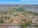 Panoramic aerial view showcasing the property, nearby residences, and the beautiful cityscape beyond at 2300 Olsen Rd, Haines City, FL 33844