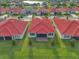 An elevated view showcasing the property's red tile roof and outdoor space at 2335 Symphony Cir, St Cloud, FL 34771