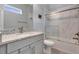 Bathroom with granite countertops, tile shower and glass door at 2335 Symphony Cir, St Cloud, FL 34771