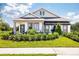 Charming single-story home with well-manicured landscaping, and covered entryway at 2547 Great Heron Ave, St Cloud, FL 34773