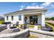 Enjoy this home's lovely outdoor patio, complete with a fire pit, comfortable seating and attractive hardscaping at 2547 Great Heron Ave, St Cloud, FL 34773