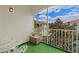 The balcony has a small table and chairs at 2549 Maitland Crossing Way # 306, Orlando, FL 32810
