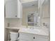 Bright bathroom featuring a vanity with sink, a toilet and an accent seahorse statue at 2549 Maitland Crossing Way # 306, Orlando, FL 32810