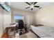 Bedroom featuring a large window and desk area plus a small bed at 2549 Maitland Crossing Way # 306, Orlando, FL 32810