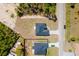 A bird's eye view presents a new construction home with a dark roof and spacious lawn in a quiet neighborhood at 2596 Sw 146 St, Ocala, FL 34473