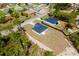 New construction home featuring a dark roof, concrete driveway, and lawn in a Gathering-friendly neighborhood at 2596 Sw 146 St, Ocala, FL 34473