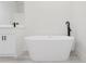 Contemporary bathroom featuring a standalone tub and modern fixtures at 2596 Sw 146 St, Ocala, FL 34473