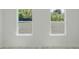 Bedroom with view to green trees from two windows at 2596 Sw 146 St, Ocala, FL 34473
