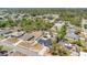 This aerial view captures a well-maintained suburban neighborhood, showcasing the property's proximity to community amenities and green spaces at 2685 Groveland Ave, Deltona, FL 32725
