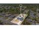 This aerial view captures a well-maintained suburban neighborhood, showcasing the property's proximity to community amenities and green spaces at 2685 Groveland Ave, Deltona, FL 32725