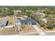 Aerial view of a well-situated home with a large yard and neighborhood surroundings at 2685 Groveland Ave, Deltona, FL 32725