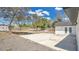 A spacious backyard features a concrete patio and a storage shed, perfect for outdoor activities at 2685 Groveland Ave, Deltona, FL 32725