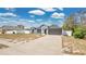 Charming single-story home boasts a two-car garage, neutral paint scheme and well-manicured landscaping at 2685 Groveland Ave, Deltona, FL 32725