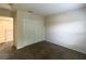 Neutral bedroom with carpet, closet, and adjacent hallway at 2840 Roccella Ct, Kissimmee, FL 34747