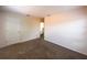 Bedroom with door and carpeted flooring, offering a cozy and inviting space at 2840 Roccella Ct, Kissimmee, FL 34747