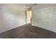 Bright bedroom with a closet and carpeted floor at 2840 Roccella Ct, Kissimmee, FL 34747