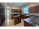Spacious kitchen features ample counter space, an island and stainless steel appliances at 2840 Roccella Ct, Kissimmee, FL 34747