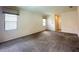 Bright living room with multiple windows offering ample natural light at 2840 Roccella Ct, Kissimmee, FL 34747
