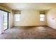 Bright and airy living room with a sliding door to the backyard at 2840 Roccella Ct, Kissimmee, FL 34747