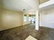 Spacious living room with neutral carpet and lots of natural light at 2840 Roccella Ct, Kissimmee, FL 34747