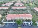 Sprawling community with multiple townhomes, pools, and mature trees at 3020 Red Ginger Rd, Kissimmee, FL 34747