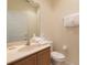 Well lit bathroom with light-colored walls and vanity at 3020 Red Ginger Rd, Kissimmee, FL 34747
