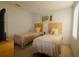 Bedroom has two beds, a nightstand, and television at 3020 Red Ginger Rd, Kissimmee, FL 34747