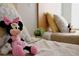 Close up of bedroom showing stuffed animal and bed at 3020 Red Ginger Rd, Kissimmee, FL 34747