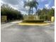 Community entrance with decorative water feature and 'Encantada' signage for a welcoming arrival at 3020 Red Ginger Rd, Kissimmee, FL 34747