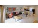 Bright and open living area features a kitchen and dining area, with tiled flooring at 3020 Red Ginger Rd, Kissimmee, FL 34747