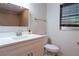 Clean bathroom featuring a modern vanity, a mirror, and a tiled shower at 30542 Hoylake St, Sorrento, FL 32776