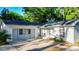 Charming home featuring a well-maintained lawn, a garage, and a brick-paved driveway at 30542 Hoylake St, Sorrento, FL 32776